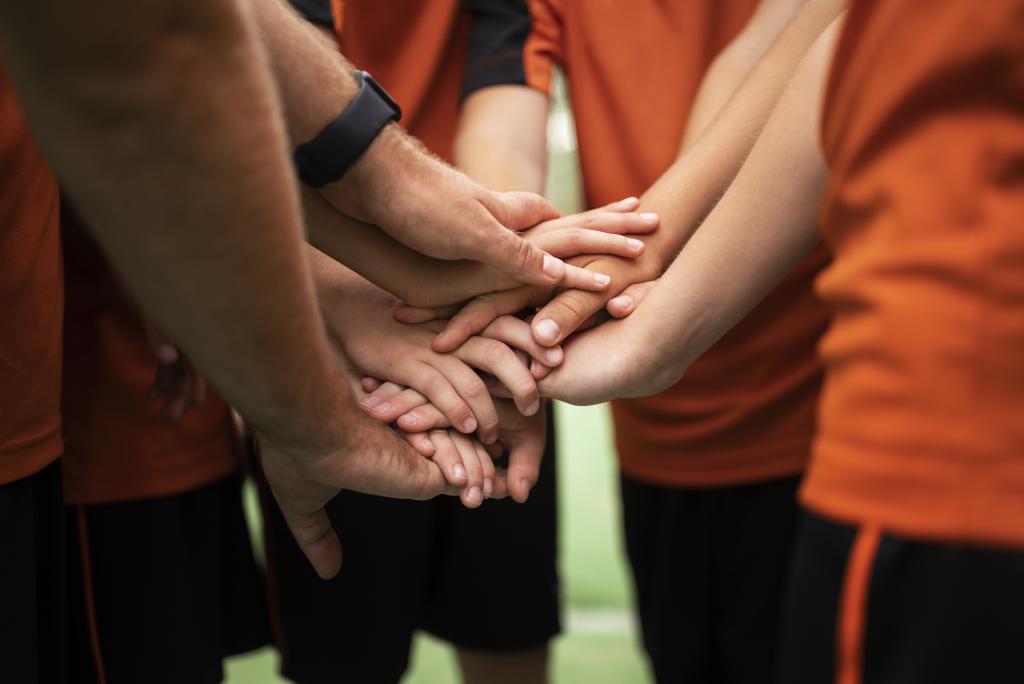 football trainer teaching his pupils
