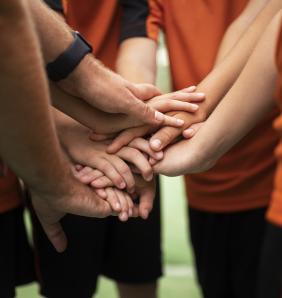 football trainer teaching his pupils